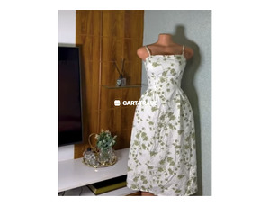 Stylish White Dress with Green Floral Design