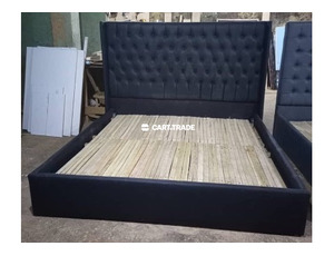 A WOODEN TUFTED BED SET - 2